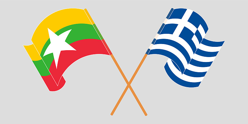 Crossed and waving flags of Myanmar and Greece