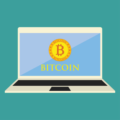 黄金比特币在笔记本上为加密货币概念，矢量插图
