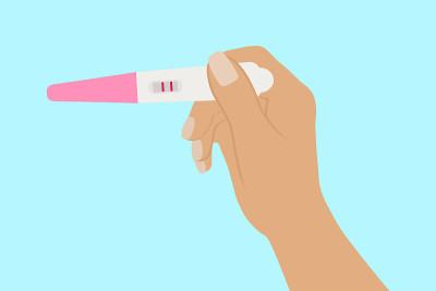 女性手握妊娠试验阳性