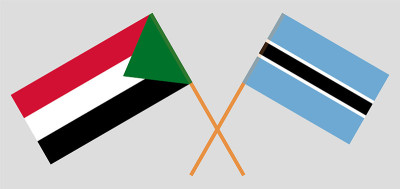 Crossed flags of Botswana and Sudan