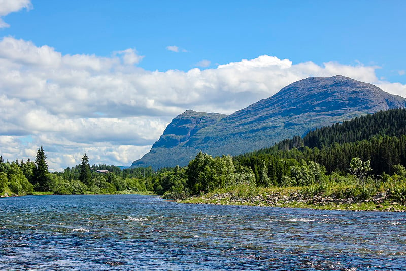 Flowing beautiful river lake Hemsila with mountain