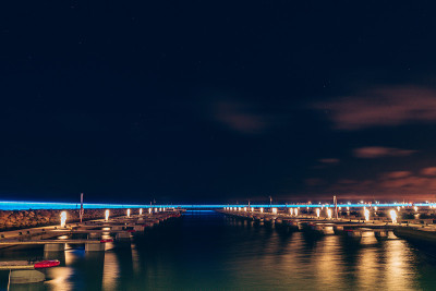 Parking for yacht in night with long exposure