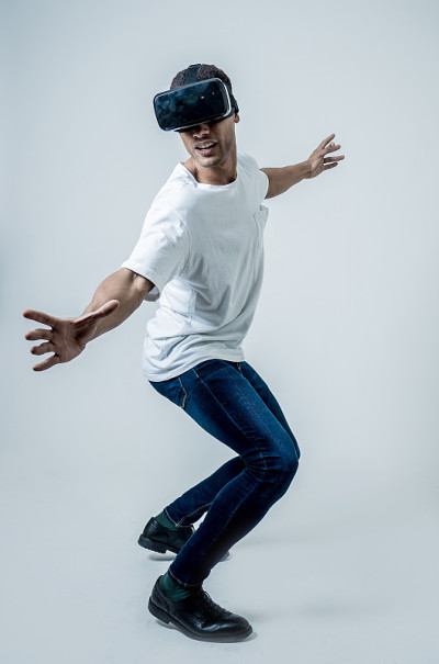 Amazed african american man surfing with augmented