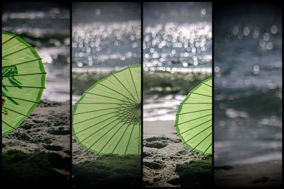 三联绿中国伞，海洋散景背景，海角梅海滩