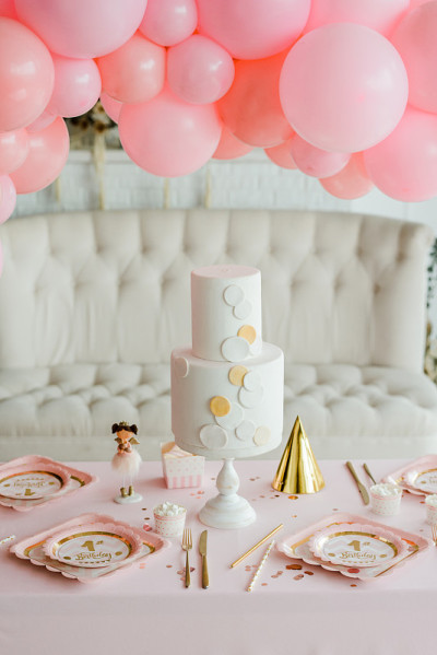 Little girl birthday party table with beautiful ca