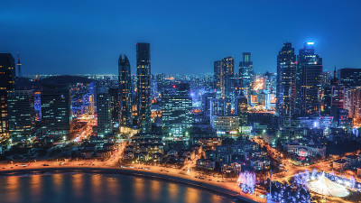 航拍青岛cbd现代建筑夜景