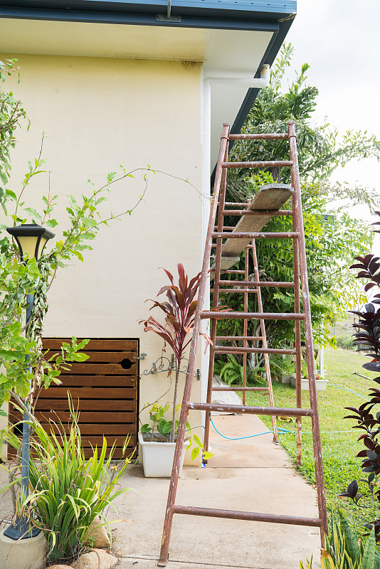 House exterior being painted with a change of colo