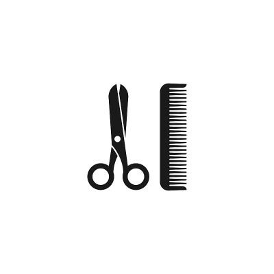 黑色剪刀和梳子。理发工具。理发店的标志。