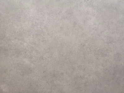 水泥墙面呈灰色，表面有光滑纹理的混凝土材料背景