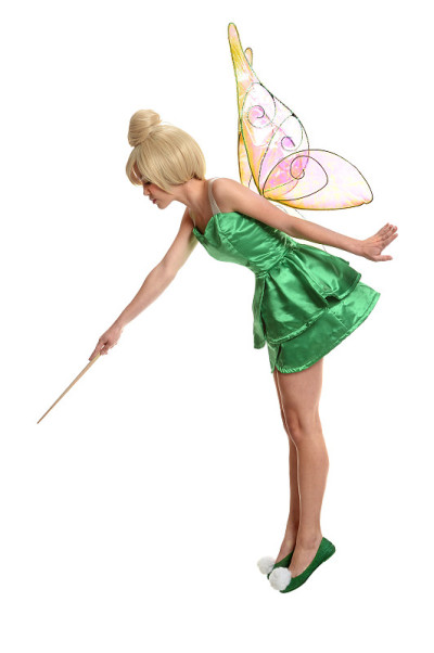 年轻的女人穿着服装，用魔杖