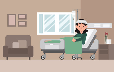 女病人正在医院病床上休息。