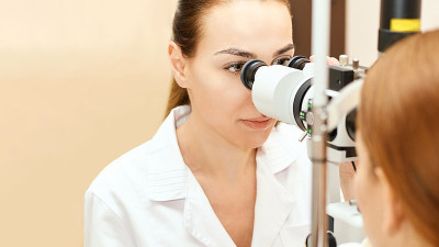 ophthalmologist doctor in exam optician laboratory