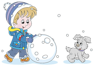 一个快乐的小男孩正在滚一个大雪球