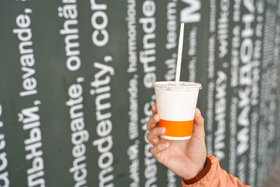 Coffee plastic cup. People hand holding takeaway t