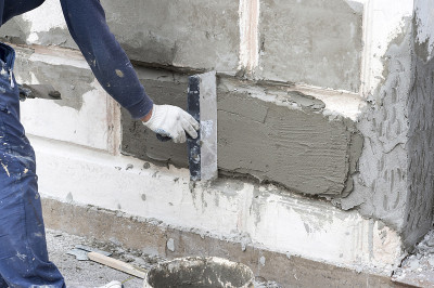 工作与建筑基础上的抹刀混凝土解决方案一致