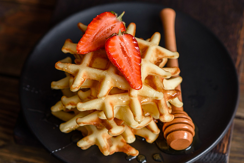 Delicious fresh baked belgian waffles with berries