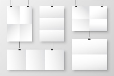 Realistic blank paper sheets hanging on binder cli
