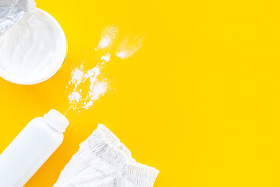 Set of children's cosmetics on a yellow background