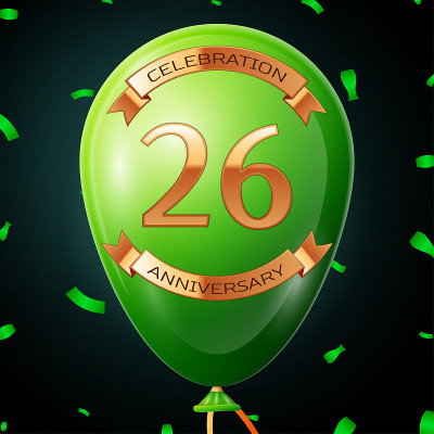 Green balloon with golden inscription twenty six y