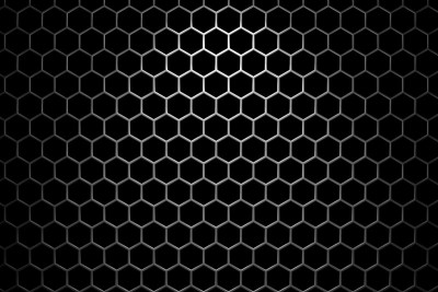 聚光灯下有六角孔的钢格栅