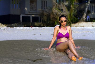 Woman with bikini sit relax on beach at beach Koh 