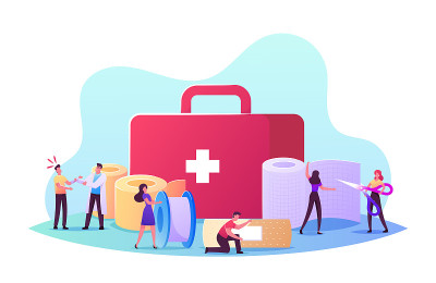 医院专业护士或医生用医用绷带包扎病人的手。医疗箱和绷带卷