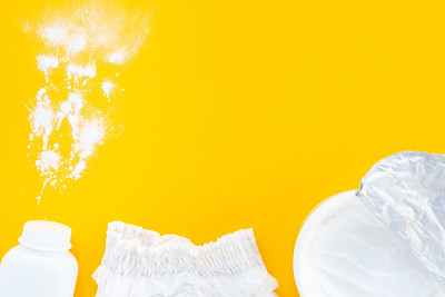 Set of children's cosmetics on a yellow background
