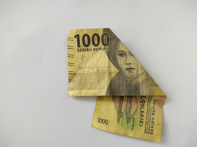 Indonesian paper money on white background.IDR cas