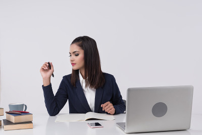 Business woman sit in office. use laptop work cont