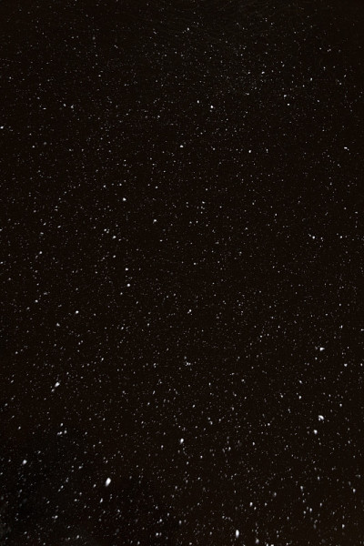 夜晚飘落的雪花背景，质地