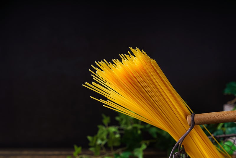 Pasta isolated on wooden table