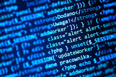 PHP开发，网站软件代码。数据加密安全代码显示在电脑上。程序员开发人员屏幕概念