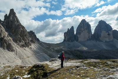 A woman in hiking outfit enjoying the view on the 