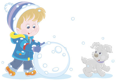 一个快乐的小男孩正在滚一个大雪球