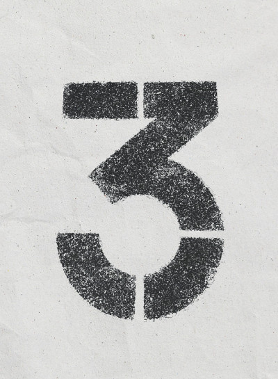 “3”在白色再生纸上用铅笔画的数目
