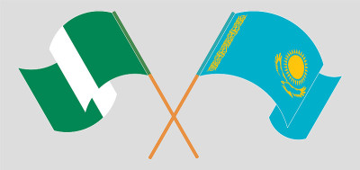 Crossed and waving flags of Nigeria and Kazakhstan