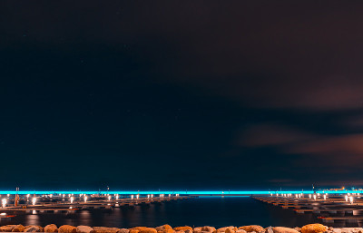 Parking for yacht in night with long exposure