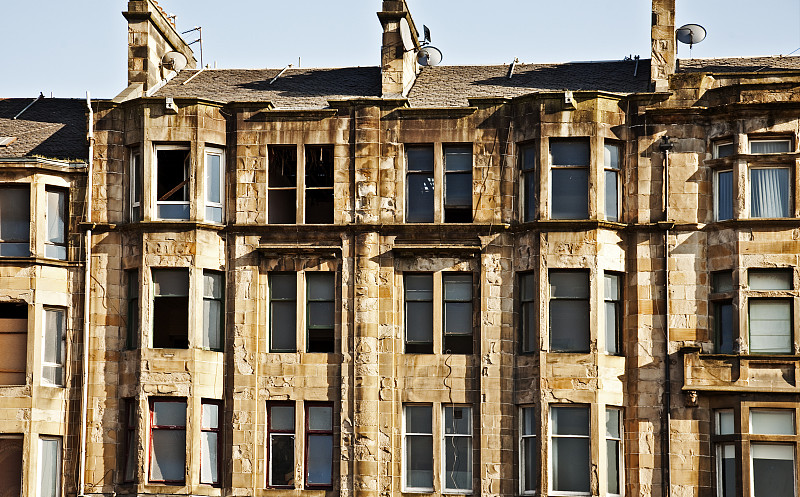 Abandoned derelict tenement block of flats