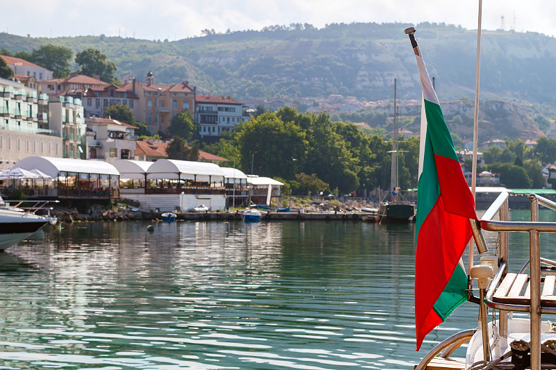 Bulgarian flag on pleasure boat, moored in marina 