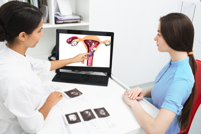 Gynecology, consultation. Gynecologist explains to
