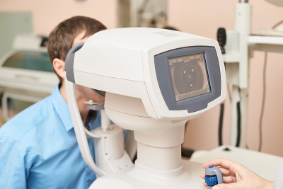 ophthalmologist doctor in exam optician laboratory