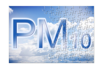 减少空气中的颗粒物(PM10) -拼图形状的概念图像