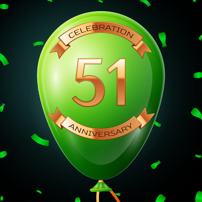 Green balloon with golden inscription fifty one ye