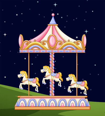 A carousel in the park at night