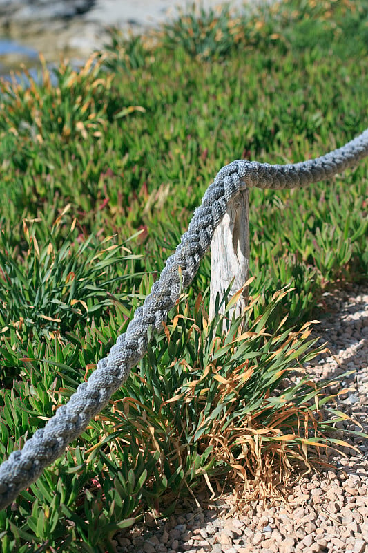 Ropes in a way to the beach