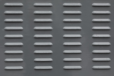 Flatlay of metal ventilation panel with dashed gap