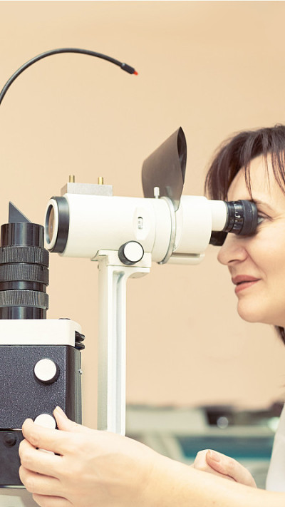 ophthalmologist doctor in exam optician laboratory