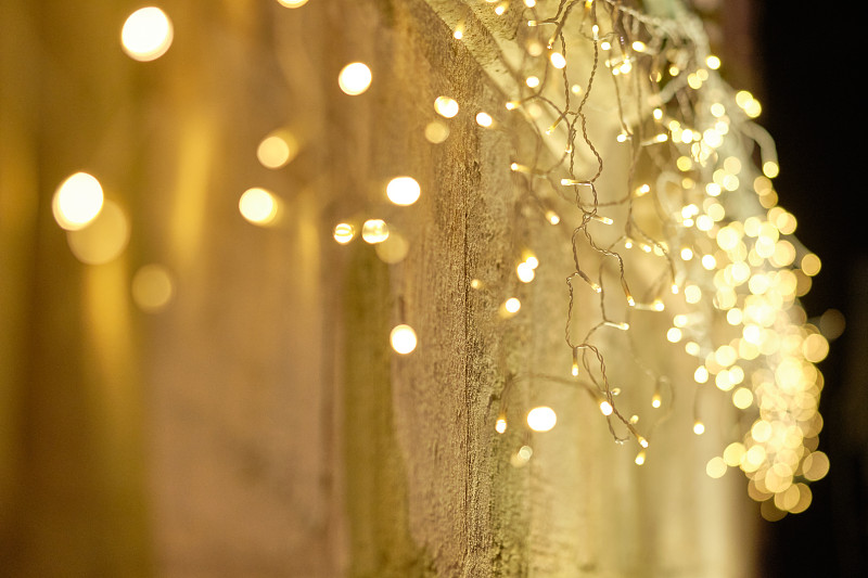 Beautiful bright festive fairy lights on a house w