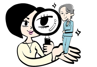 用放大镜看细节的女人