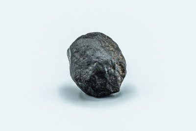 Black magnetic Tektite Meteorite isolated, piece o